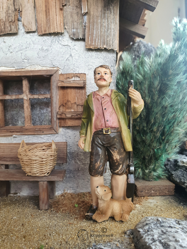 Artikel anzeigen Krippenfigur aus Kunstharz - ein Jäger mit Hund