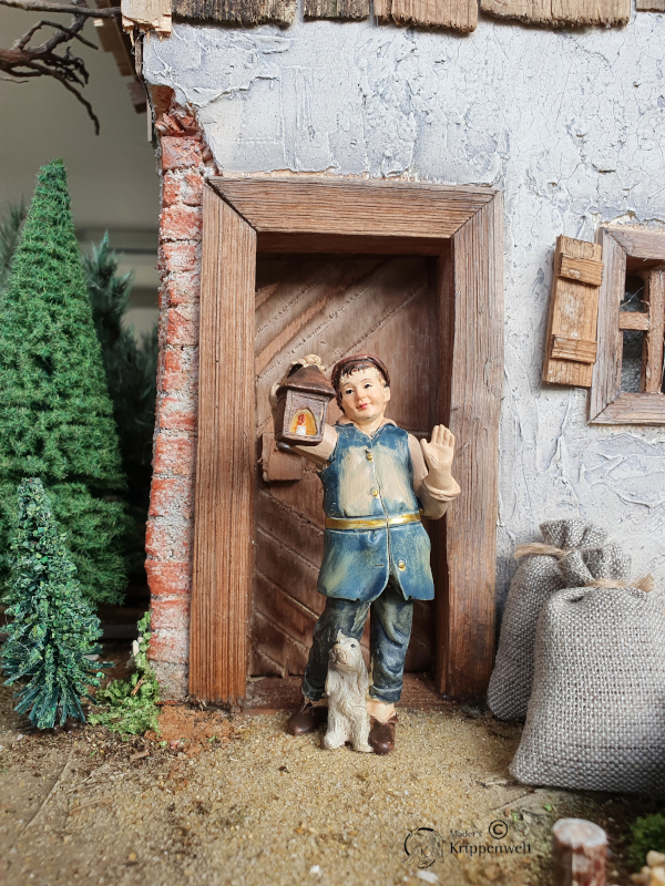 Artikel anzeigen Krippenfigur aus Kunstharz - ein abweisender Wirt mit Laterne und Hund
